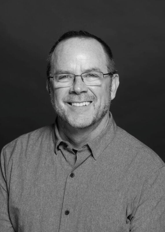 Black and white headshot of Rick Kramer. Rick Kramer is Dragos’s Chief Revenue Officer (CRO)